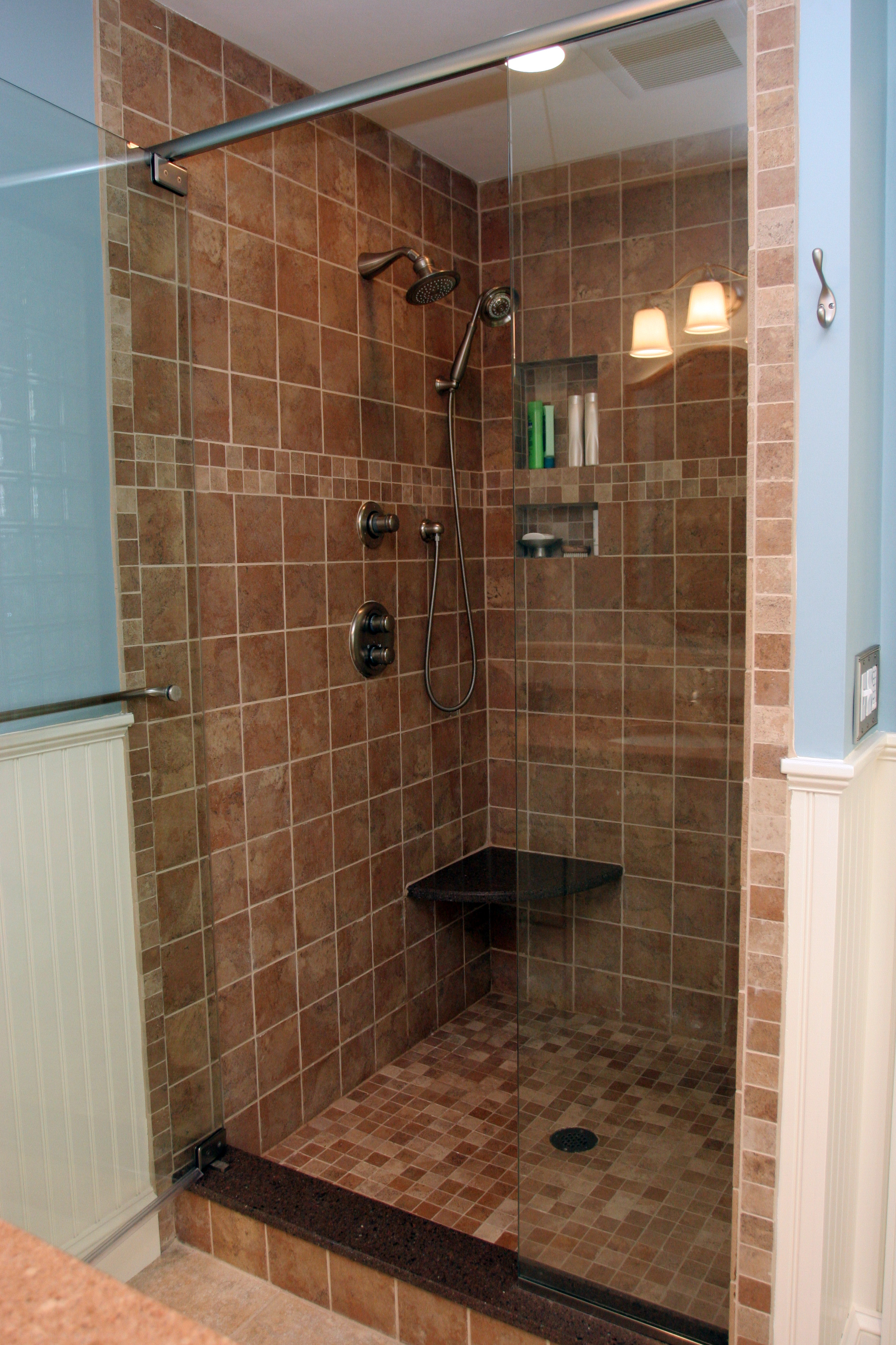 AFTER: A TILE SHOWER WITH GLASS DOOR